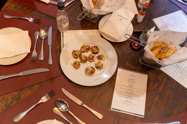 How can a restaurant create a memorable dining experience with a themed menu?